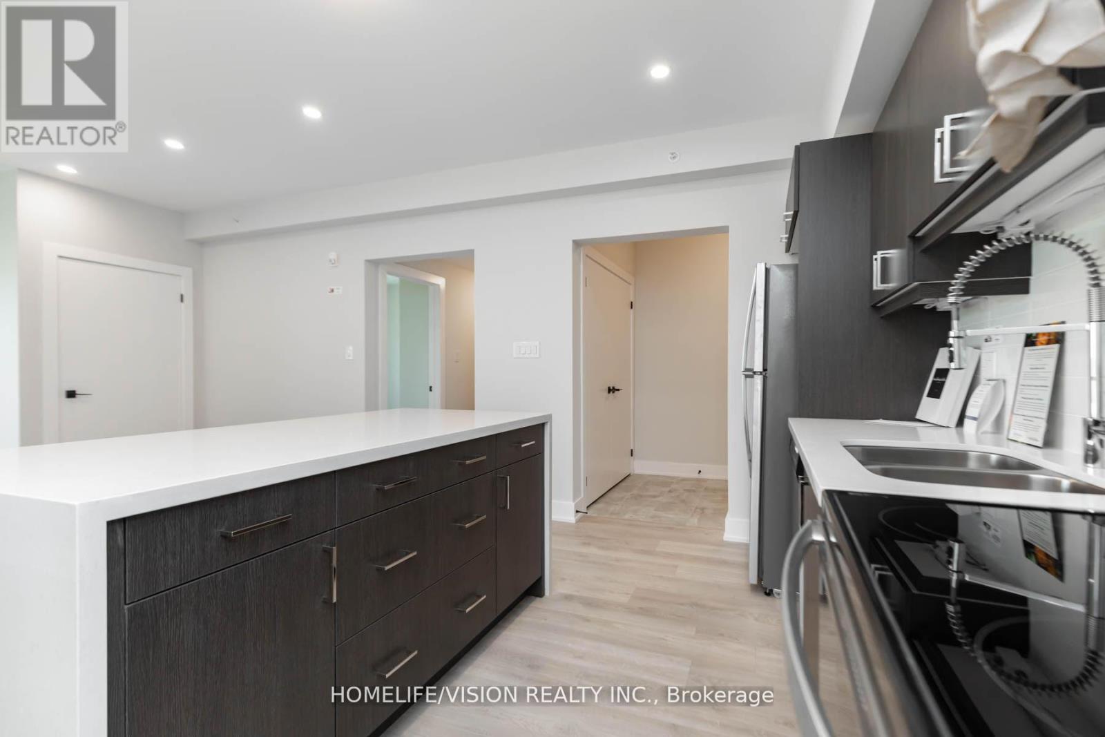 312 - 1 Chef Lane, Barrie, ON - Indoor Photo Showing Kitchen With Double Sink