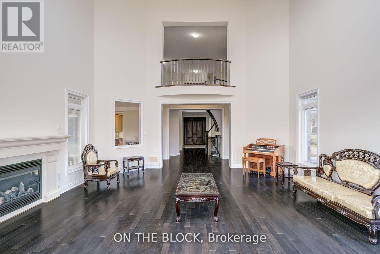 24 Whitewood Drive, Whitchurch-Stouffville, ON - Indoor Photo Showing Living Room With Fireplace
