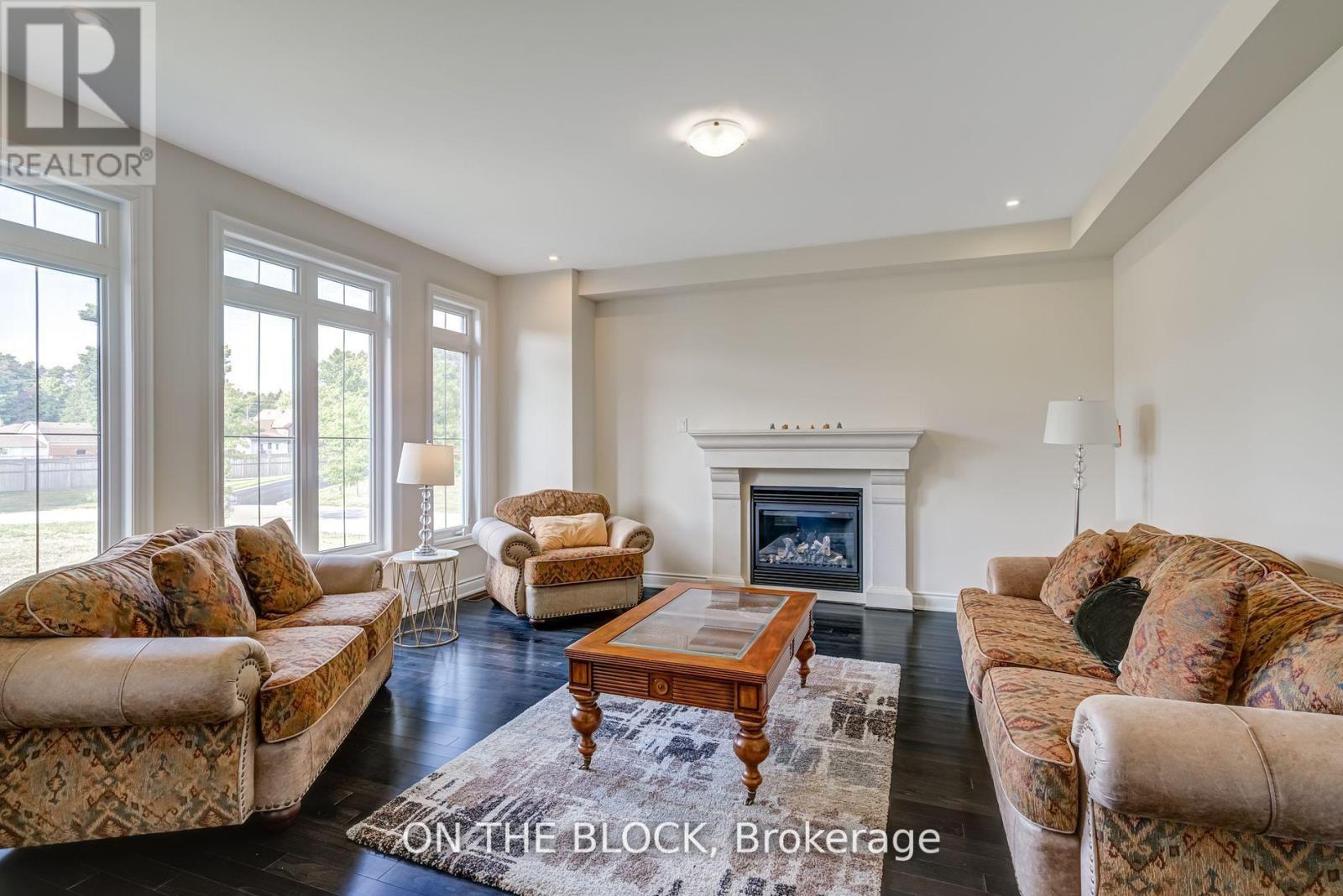 24 Whitewood Drive, Whitchurch-Stouffville, ON - Indoor Photo Showing Living Room With Fireplace
