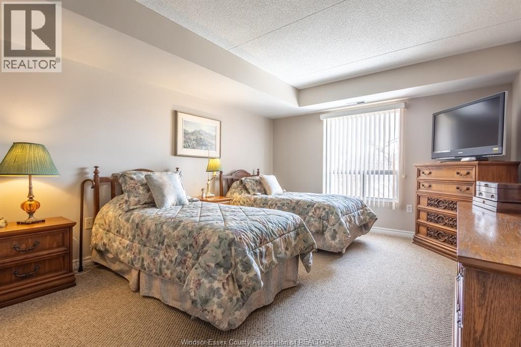 99 Robson Unit# 203, Leamington, ON - Indoor Photo Showing Bedroom