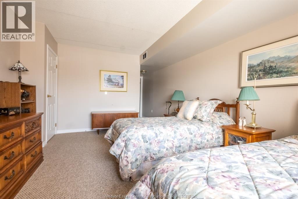 99 Robson Unit# 203, Leamington, ON - Indoor Photo Showing Bedroom