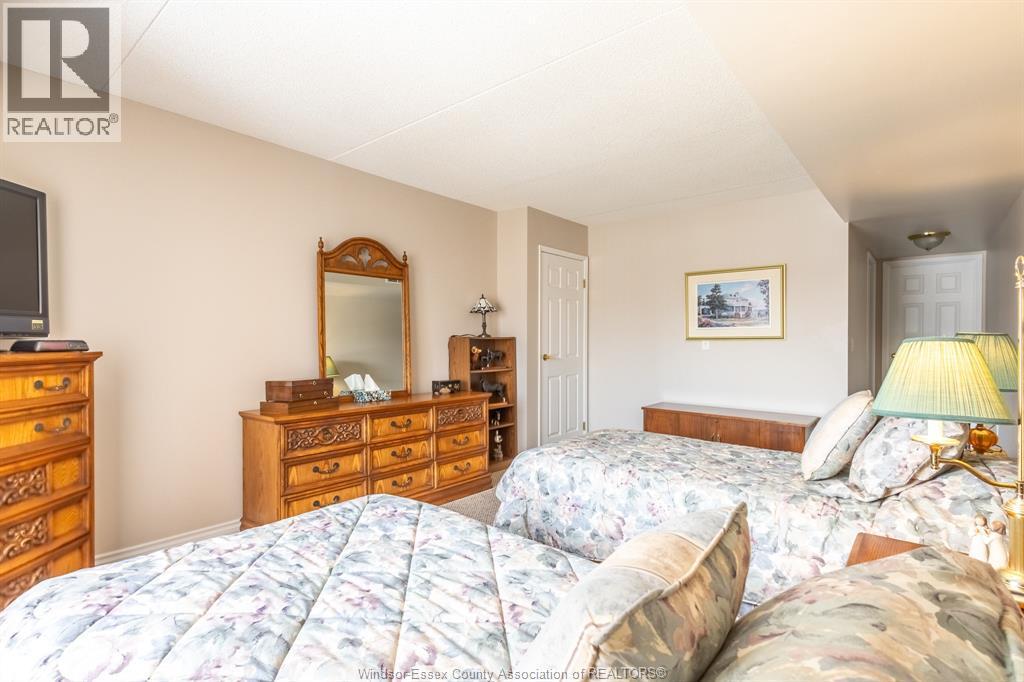 99 Robson Unit# 203, Leamington, ON - Indoor Photo Showing Bedroom
