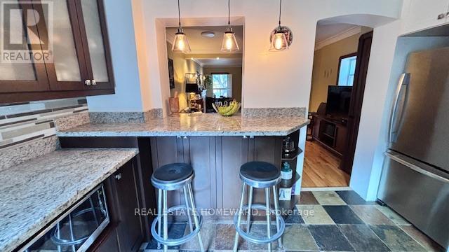 View from Kitchen Breakfast Bar - Main & 2Nd Floors - 457 Mortimer Avenue, Toronto, ON - Indoor Photo Showing Kitchen