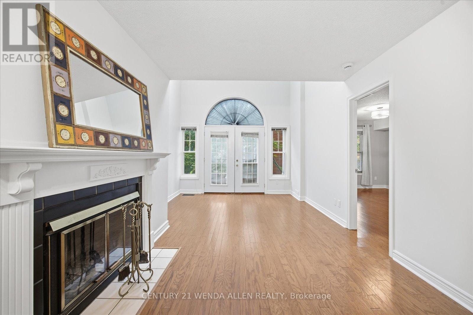 D16 - 1663 Nash Road, Clarington, ON - Indoor Photo Showing Other Room With Fireplace