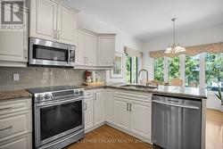 Main floor: Kitchen with Solid Counter Tops -