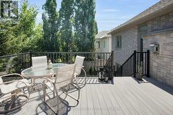 Back Yard: Upper Deck with Eating Area -