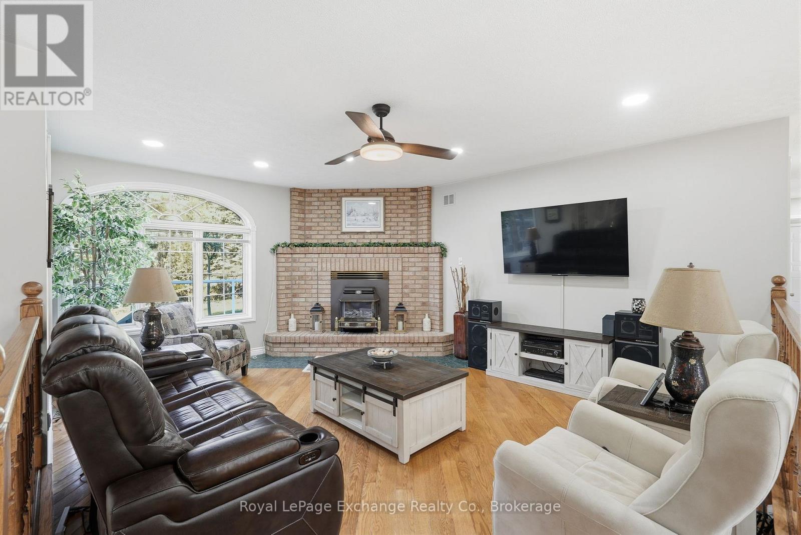 115 Deerhurst Drive, Huron-Kinloss, ON - Indoor Photo Showing Living Room With Fireplace