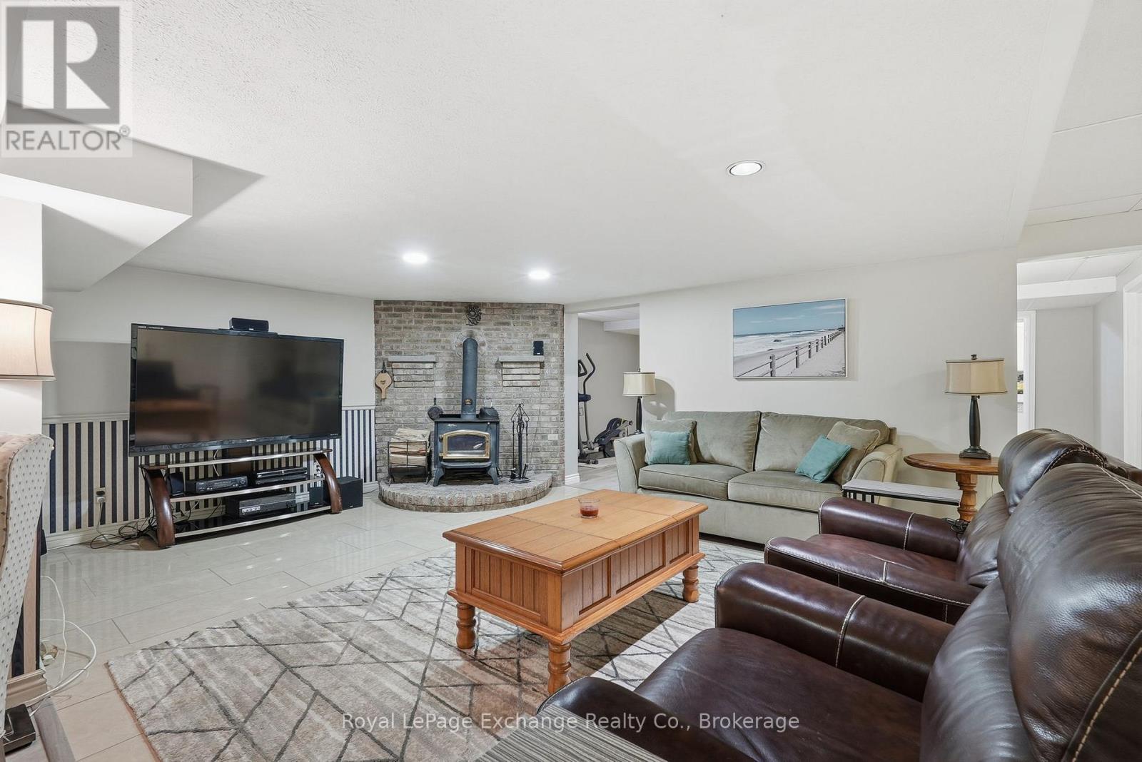 115 Deerhurst Drive, Huron-Kinloss, ON - Indoor Photo Showing Living Room With Fireplace