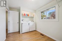 4th bedroom (currently used as a laundry room) -