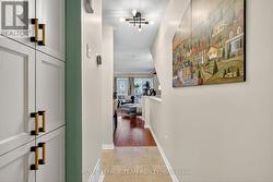 Hallway to open concept main living space. -