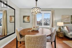 Spacious Dining Rm overlooks Living Rm. -