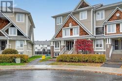 2 Bedroom & 2.5 Bath lower level end unit! -