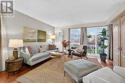 Patio doors in LR lead to private rear deck. -