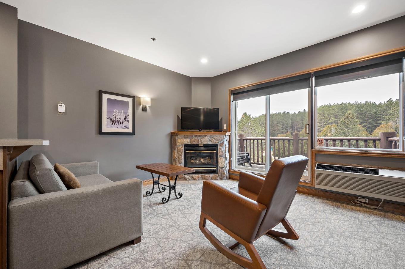 Living room - 338-2396 Rue Labelle, Mont-Tremblant, QC - Indoor Photo Showing Living Room With Fireplace