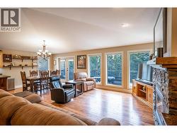 open plan living room w/ beautiful forest view -