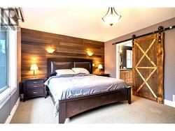 Spacious Primary Bedroom with gorgeous Barn door to Ensuite -