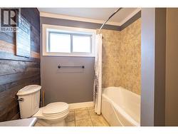 main bathroom with lots of counter space & full bath shower -