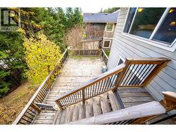 stairs from upper balcony/deck to lower deck -
