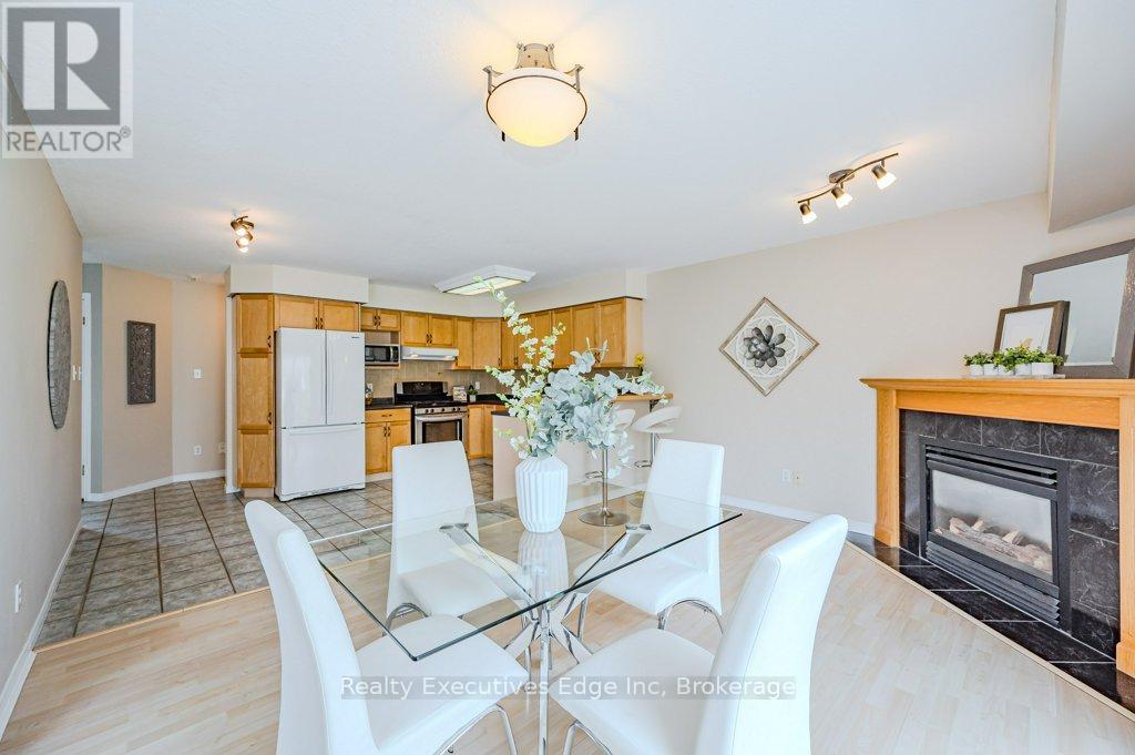 Main - 5 Camm Crescent, Guelph (Pineridge/Westminster Woods), ON - Indoor Photo Showing Dining Room With Fireplace