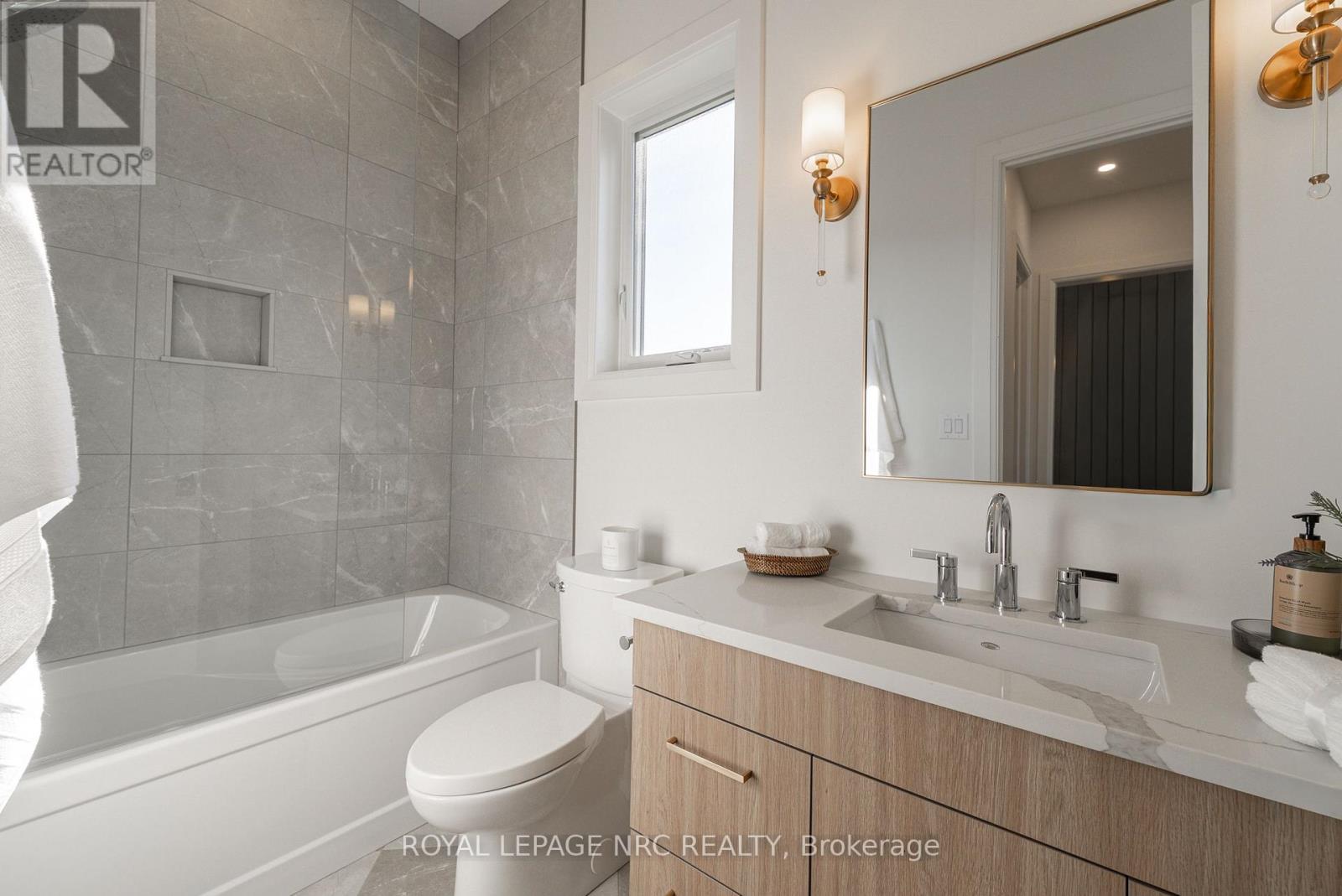 Interior photos are of beachside model on Lot36 - 611 (Lot 20) Mississauga Avenue, Fort Erie (Lakeshore), ON - Indoor Photo Showing Bathroom
