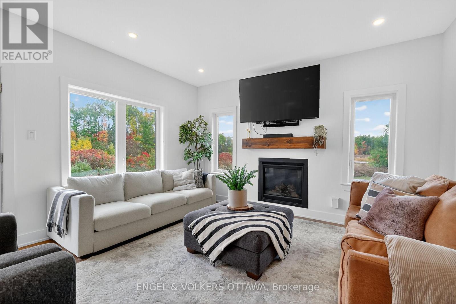 Living Rm - 57 Paul A. Bertrand Drive, Mcnab/Braeside, ON - Indoor Photo Showing Living Room With Fireplace