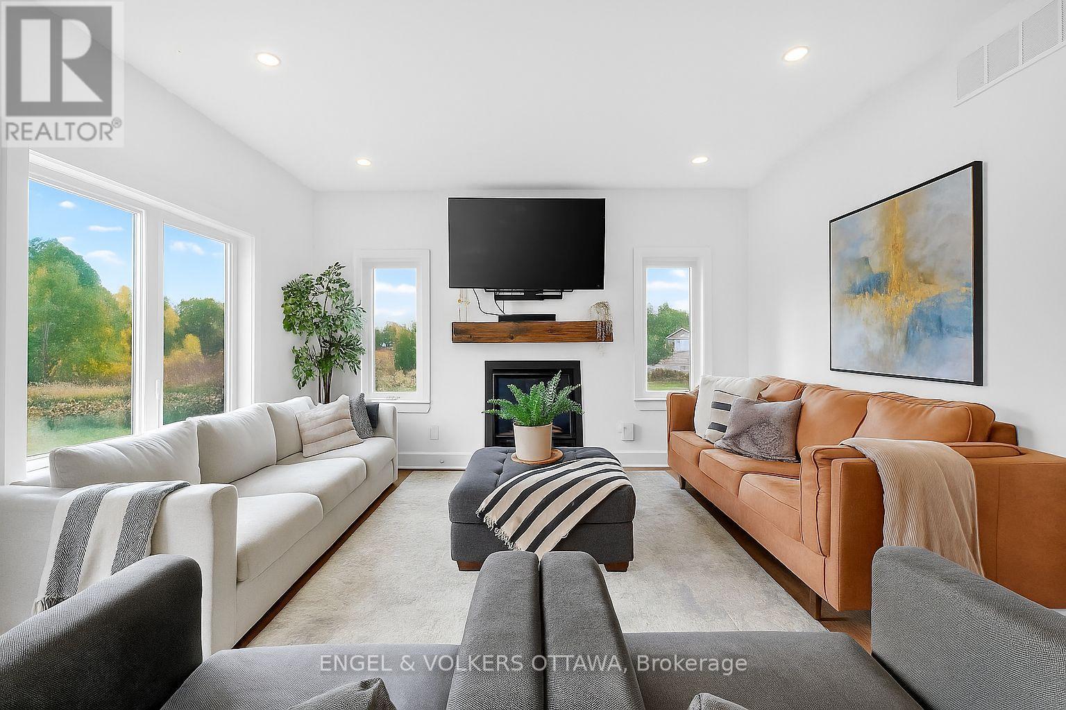 Living Rm - 57 Paul A. Bertrand Drive, Mcnab/Braeside, ON - Indoor Photo Showing Living Room With Fireplace