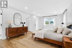 Prim Bdrm - furniture & mirror virtually staged -