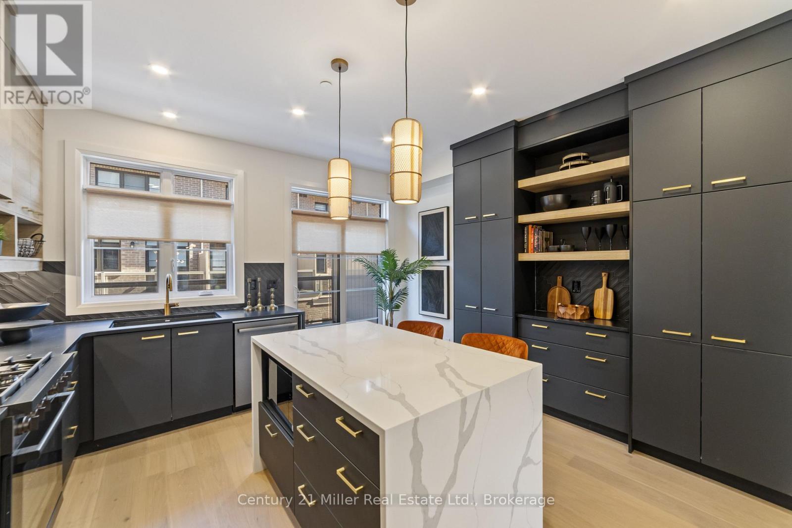 Model home shown. Upgrades at extra cost. - 30 - 280 Melody Common, Oakville (Ro River Oaks), ON - Indoor Photo Showing Kitchen With Double Sink With Upgraded Kitchen