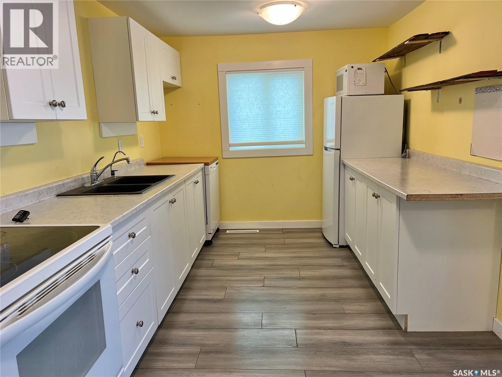 113-117 Second Street E, Yellow Creek, SK - Indoor Photo Showing Kitchen With Double Sink