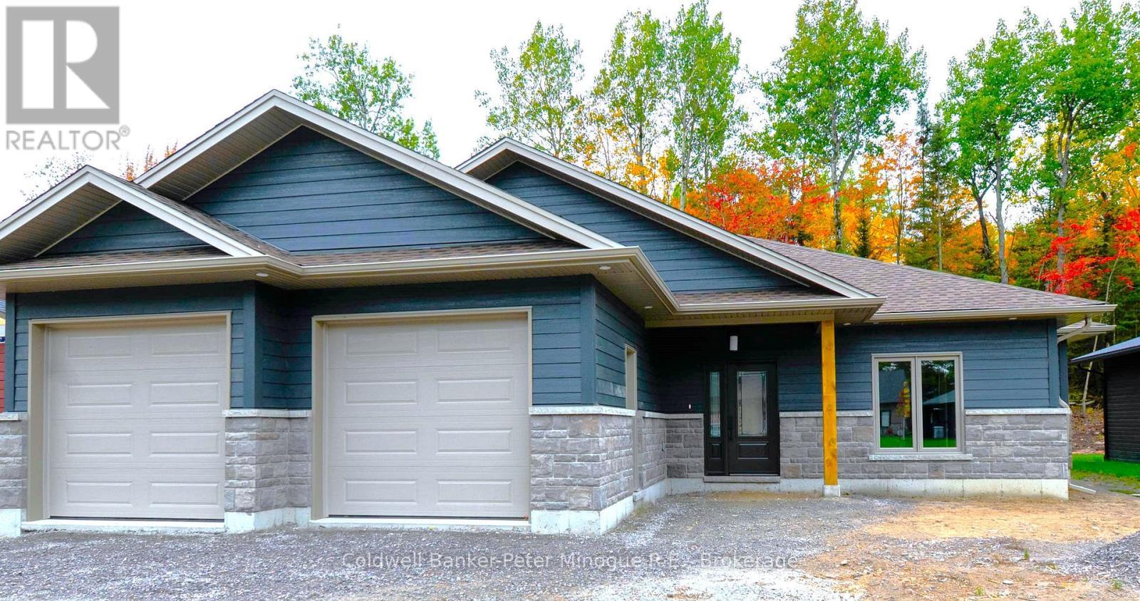 26 Masson Lane W, Callander, ON - Outdoor With Facade