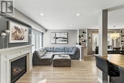 Large living room with fireplace. -