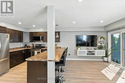 Double sink, stainless appliances. -