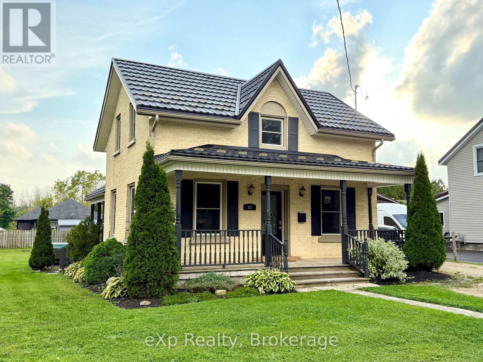 65 Elora Street N, Minto, ON - Outdoor With Deck Patio Veranda With Facade