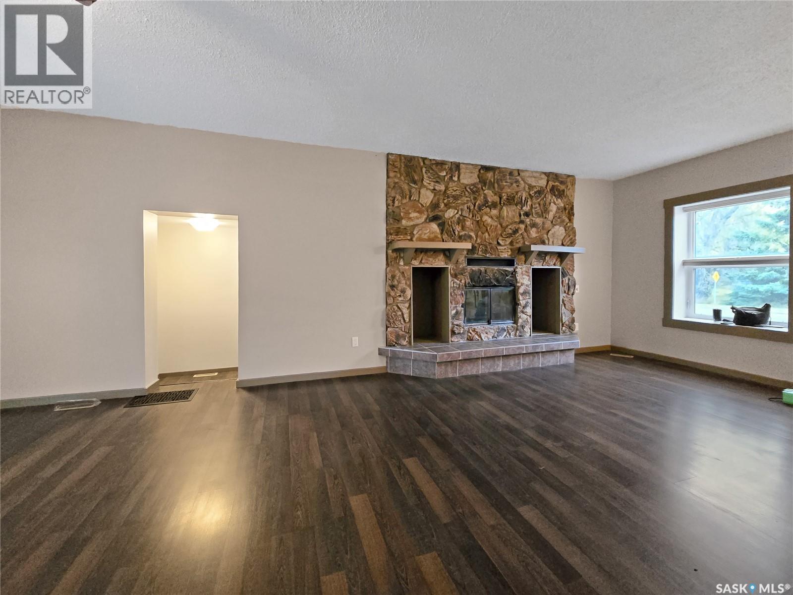 304 Eberts Street, Indian Head, SK - Indoor Photo Showing Living Room With Fireplace