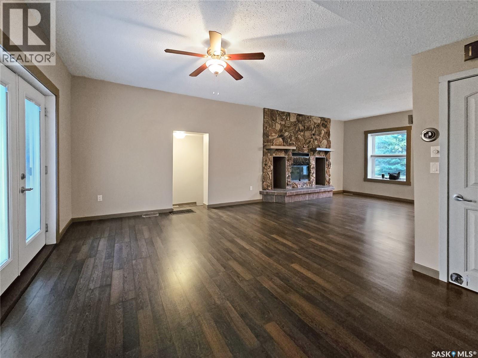 304 Eberts Street, Indian Head, SK - Indoor Photo Showing Living Room With Fireplace