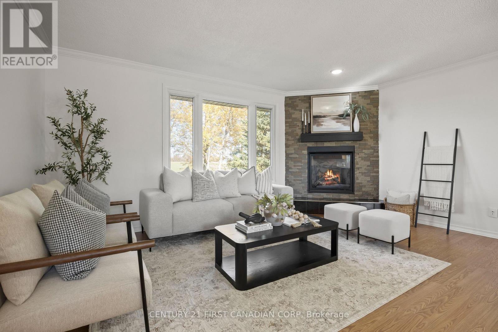 70986 B Line, South Huron (Stephen), ON - Indoor Photo Showing Living Room With Fireplace