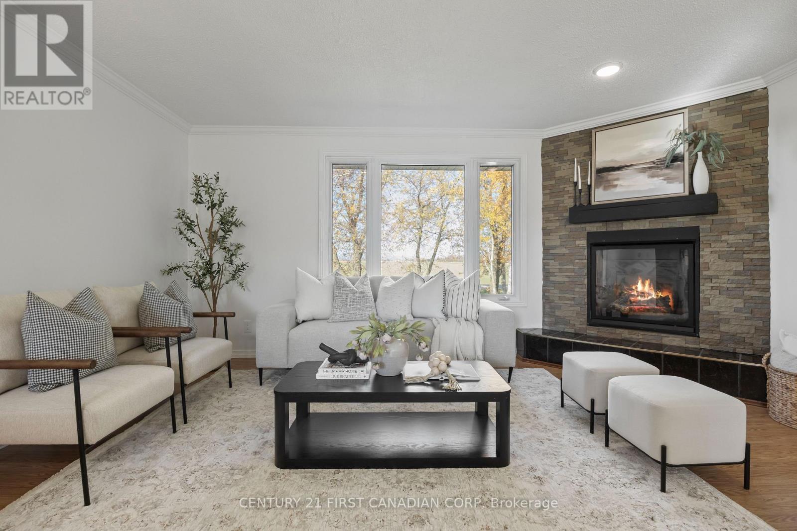 70986 B Line, South Huron (Stephen), ON - Indoor Photo Showing Living Room With Fireplace