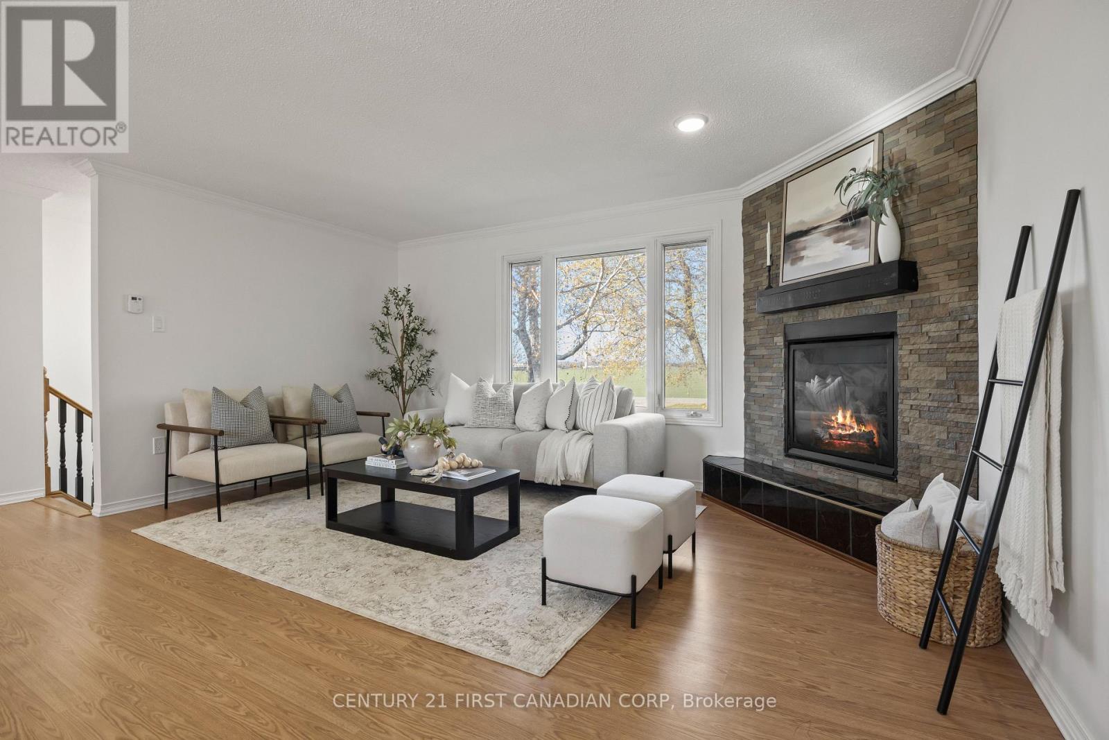70986 B Line, South Huron (Stephen), ON - Indoor Photo Showing Living Room With Fireplace