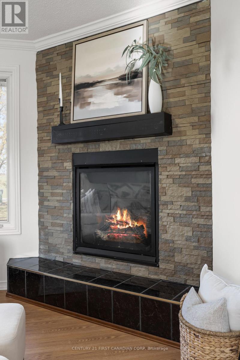 70986 B Line, South Huron (Stephen), ON - Indoor Photo Showing Living Room With Fireplace