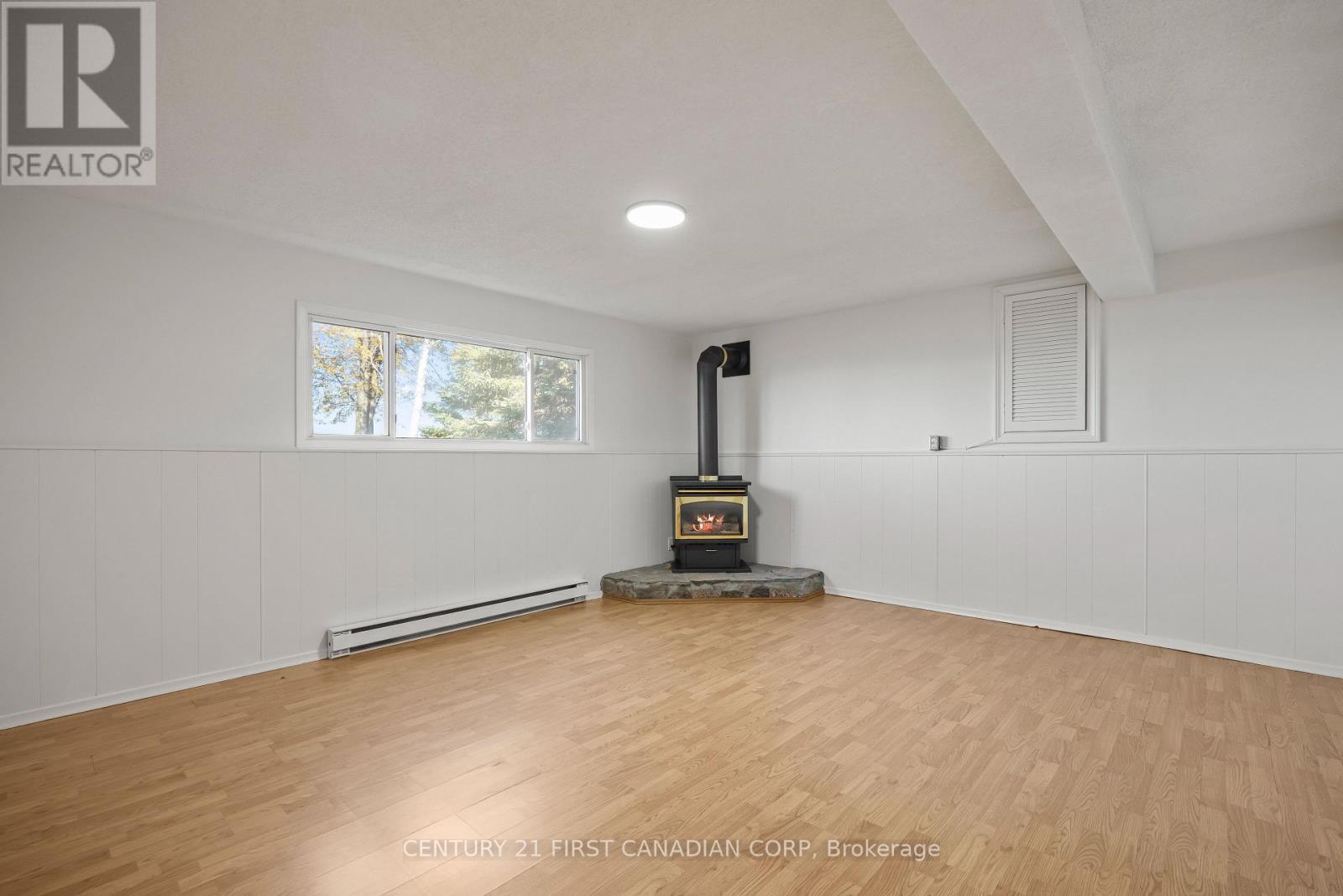 70986 B Line, South Huron (Stephen), ON - Indoor With Fireplace