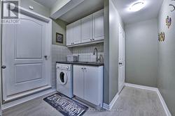 Main Floor Laundry - with Lower Level access -