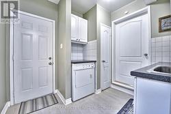 Main Floor Laundry - with Lower Level access -