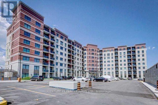 417 - 39 New Delhi Drive, Markham, ON - Outdoor With Balcony With Facade
