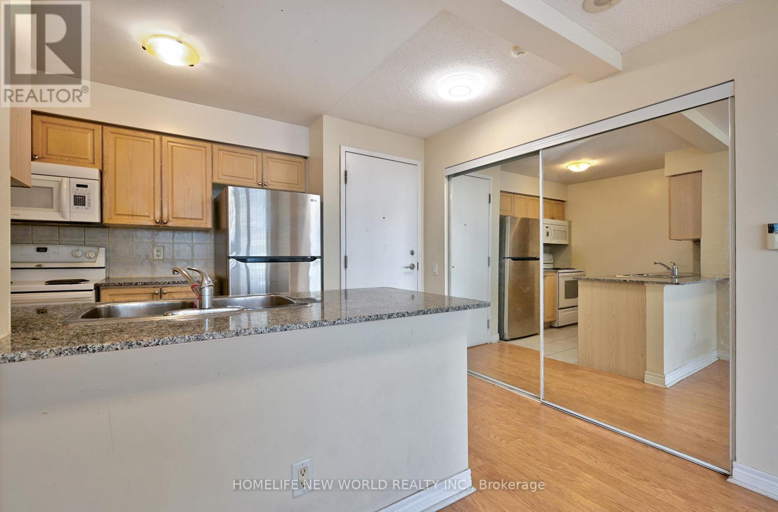 1105 - 83 Borough Drive, Toronto, ON - Indoor Photo Showing Kitchen With Double Sink