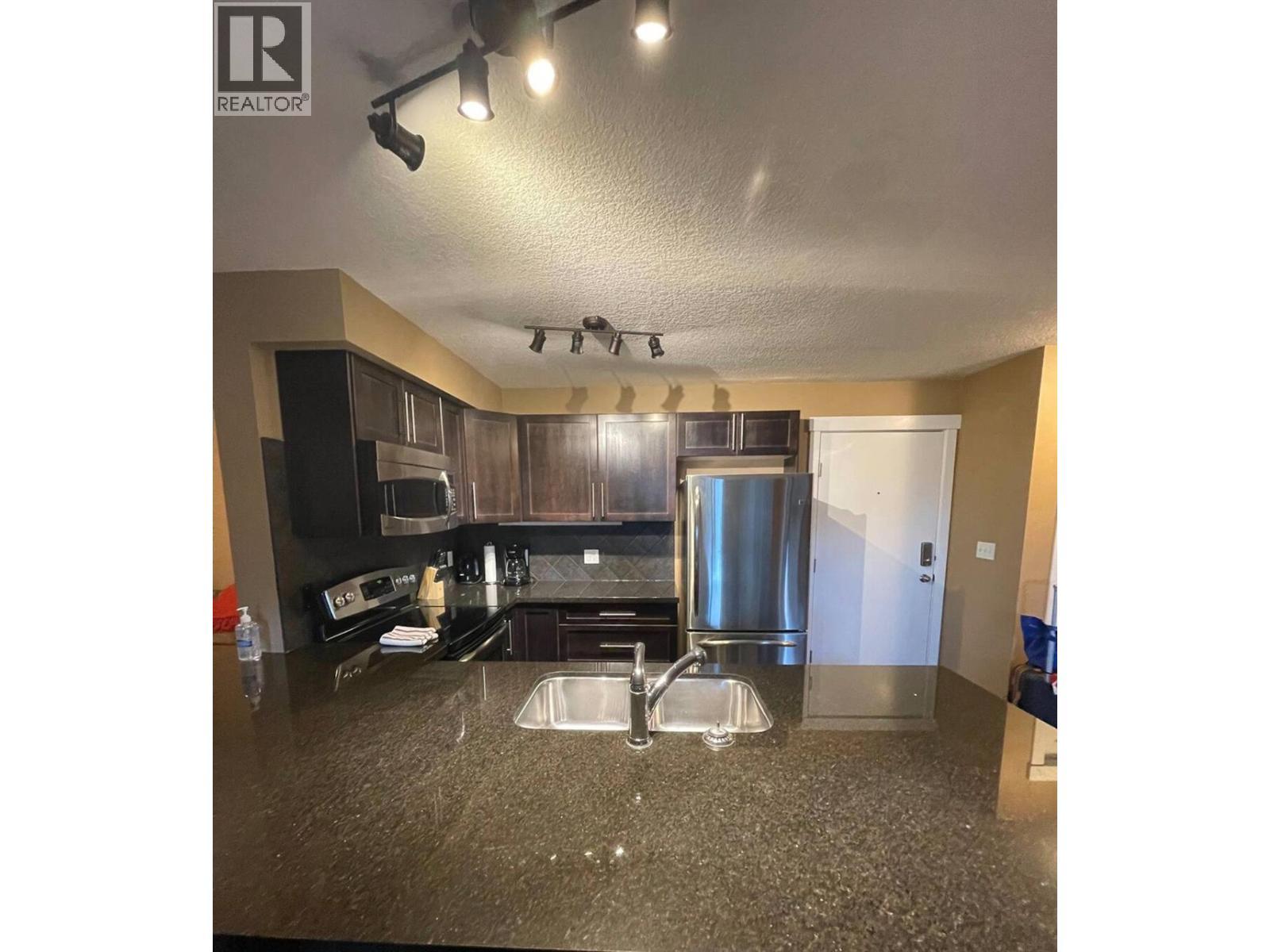 205 Third Avenue Unit# 3420, Invermere, BC - Indoor Photo Showing Kitchen With Stainless Steel Kitchen With Double Sink