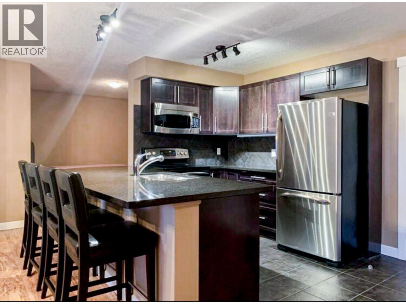 205 Third Avenue Unit# 3420, Invermere, BC - Indoor Photo Showing Kitchen With Stainless Steel Kitchen