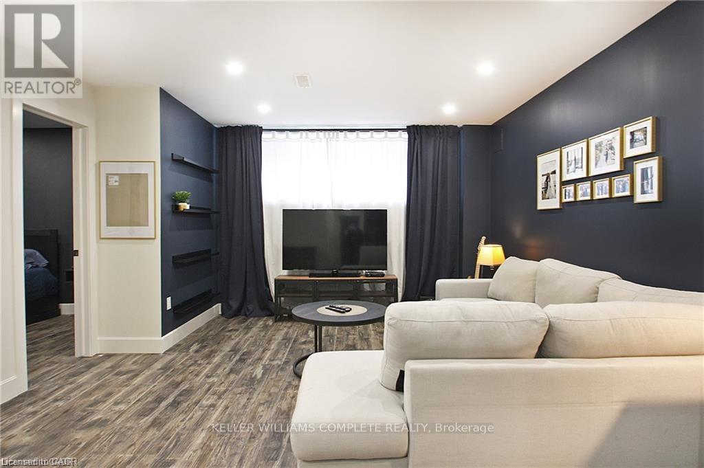 Lower - 23 Scarletwood Street, Hamilton, ON - Indoor Photo Showing Living Room
