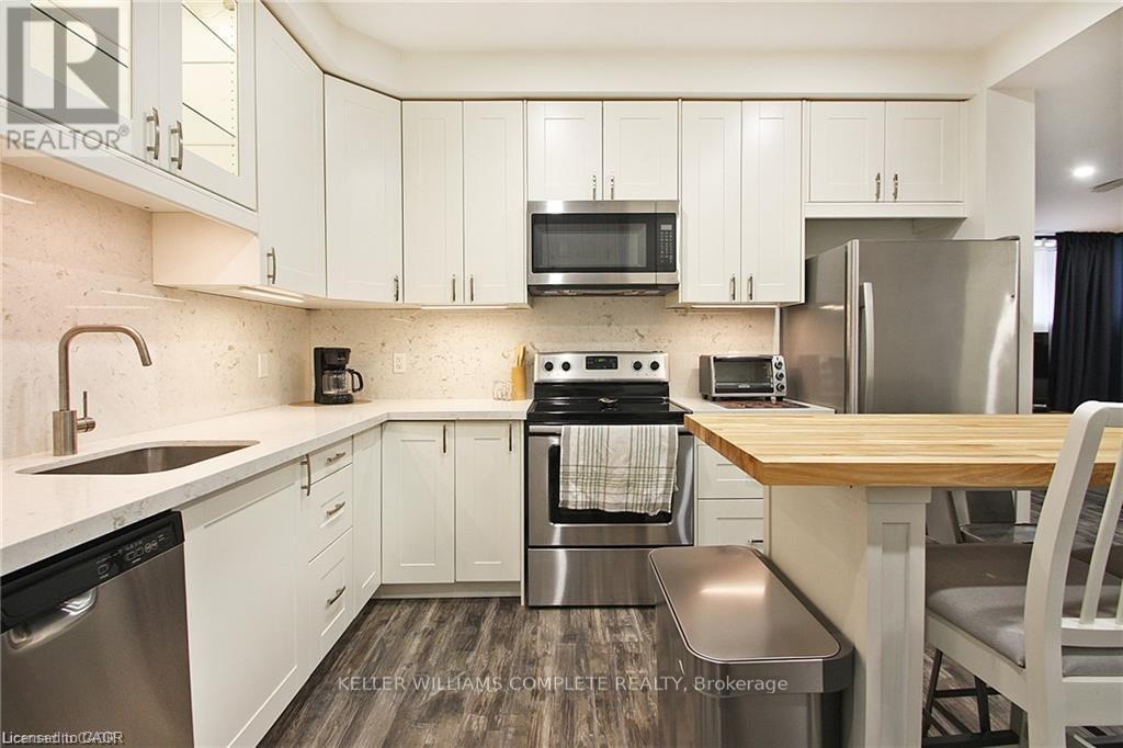 Lower - 23 Scarletwood Street, Hamilton, ON - Indoor Photo Showing Kitchen With Stainless Steel Kitchen With Upgraded Kitchen