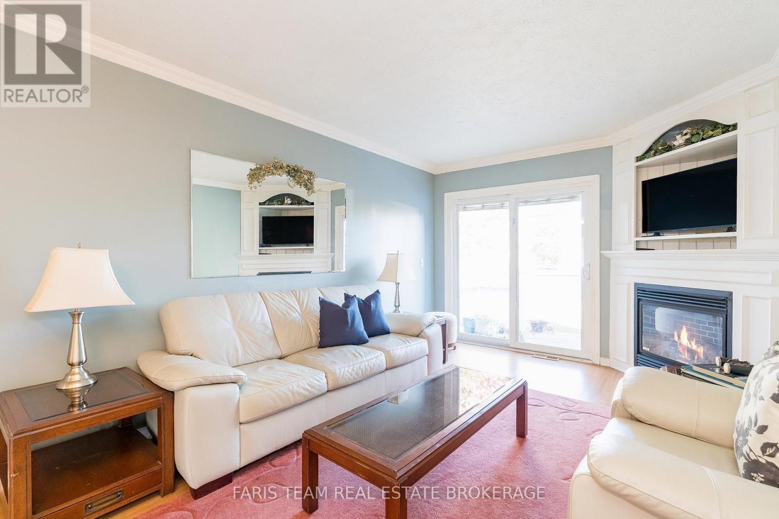 9 Julia Crescent, Orillia, ON - Indoor Photo Showing Living Room With Fireplace