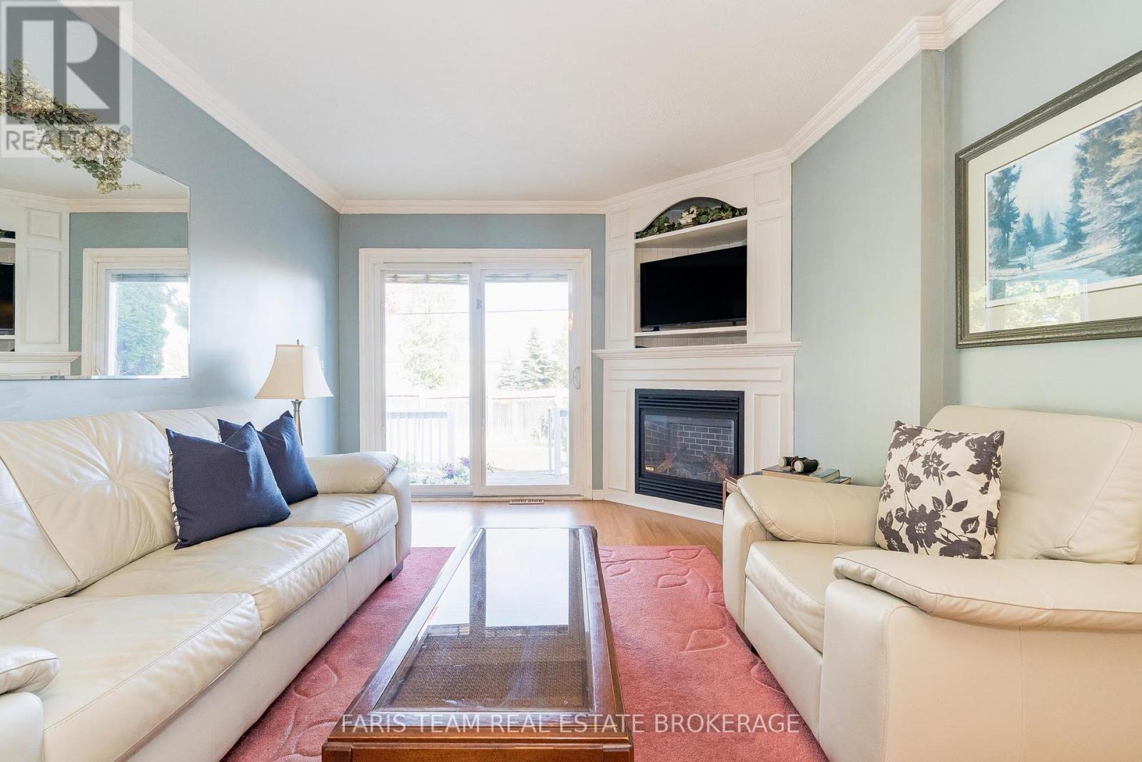 9 Julia Crescent, Orillia, ON - Indoor Photo Showing Living Room With Fireplace